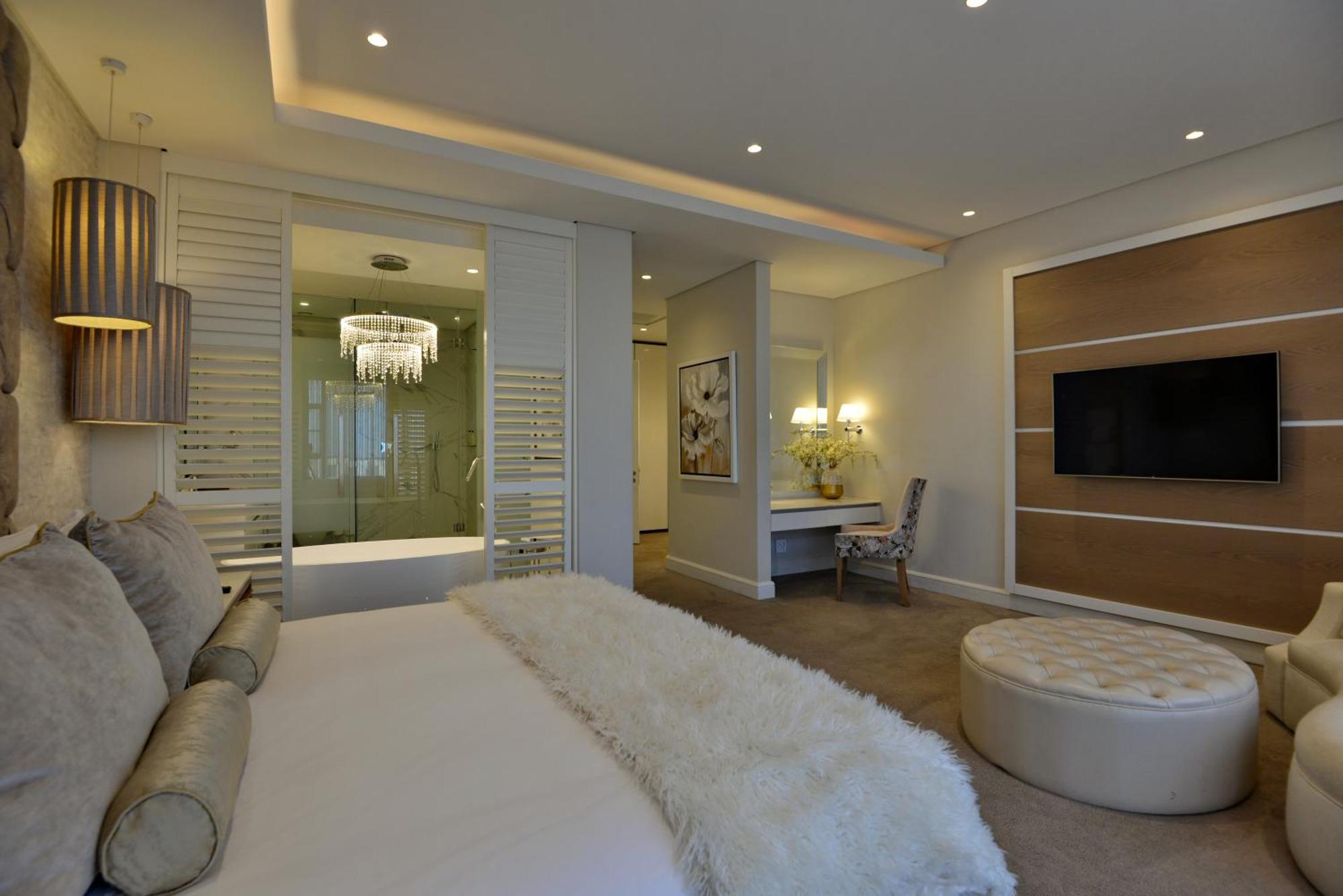 The Houghton Hotel, Spa, Wellness & Golf Johannesburg Oda fotoğraf A bedroom at The Ivy Hotel