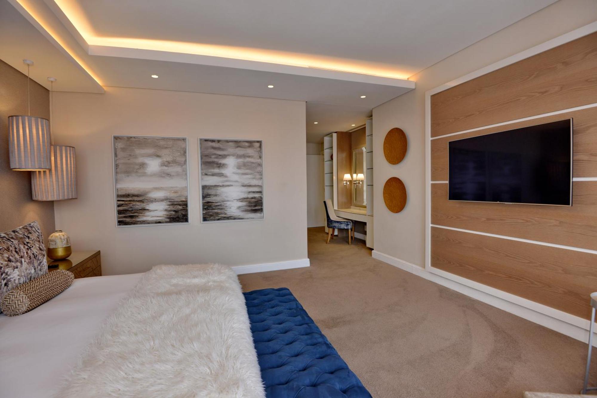 The Houghton Hotel, Spa, Wellness & Golf Johannesburg Oda fotoğraf A bedroom at The Ivy Collection